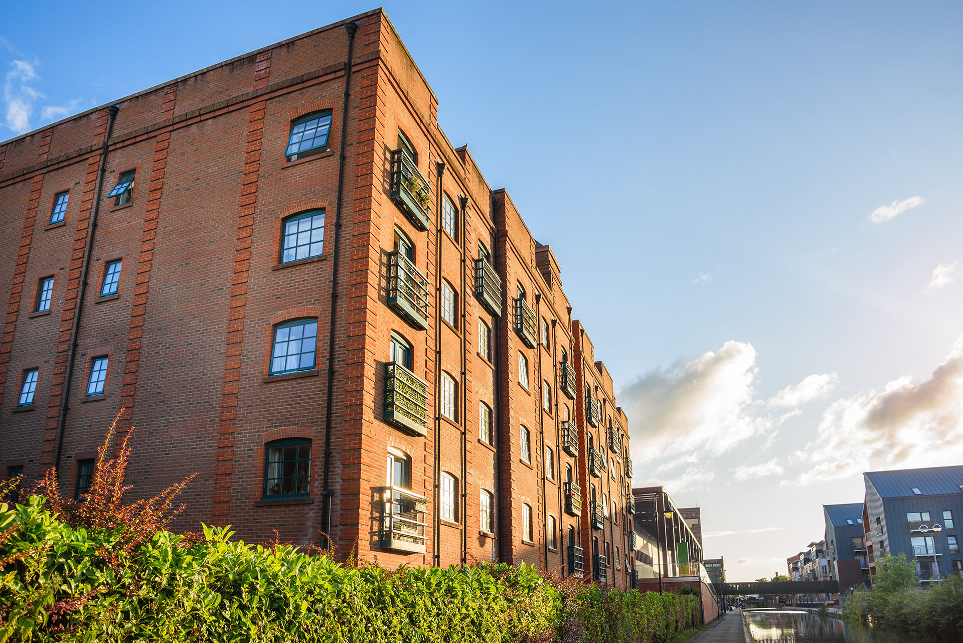 Low angle view of a brick apartment building