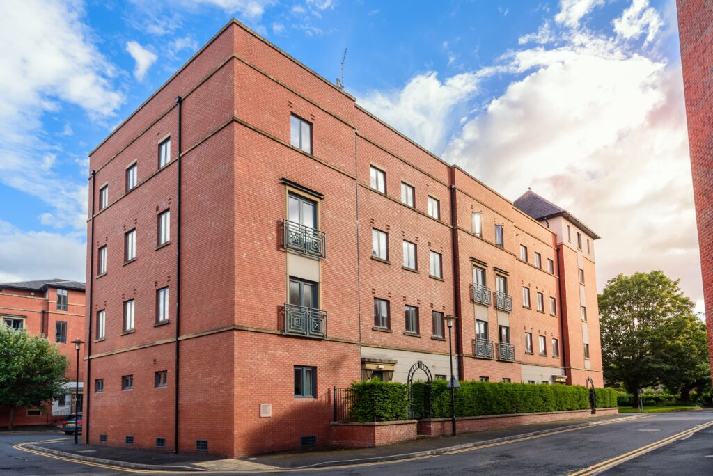 Brick Apartment Building Along A Street In A Urban Residential